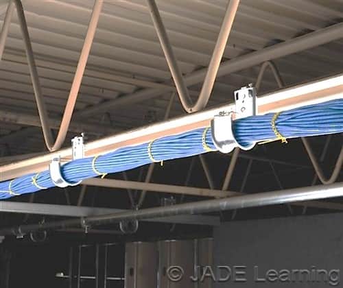 Cables supported by the building structure.